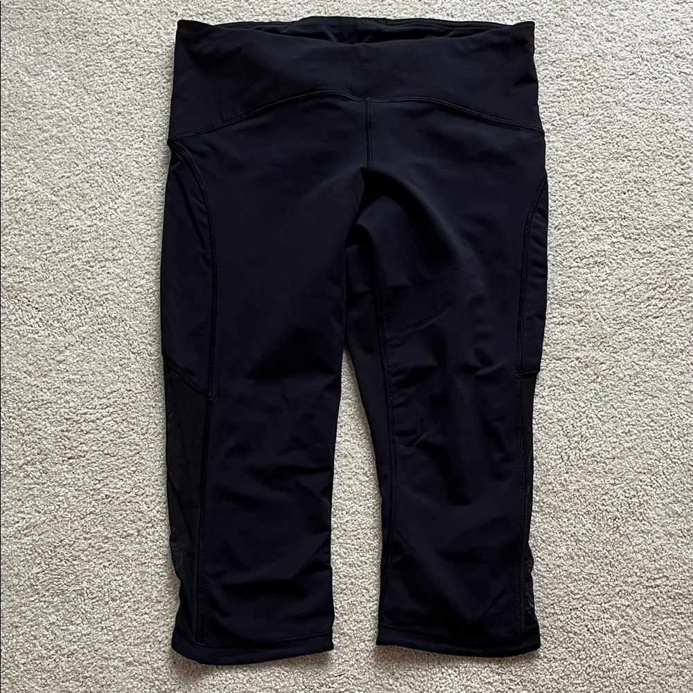 lululemon capris with zipper pocket and sheer accent